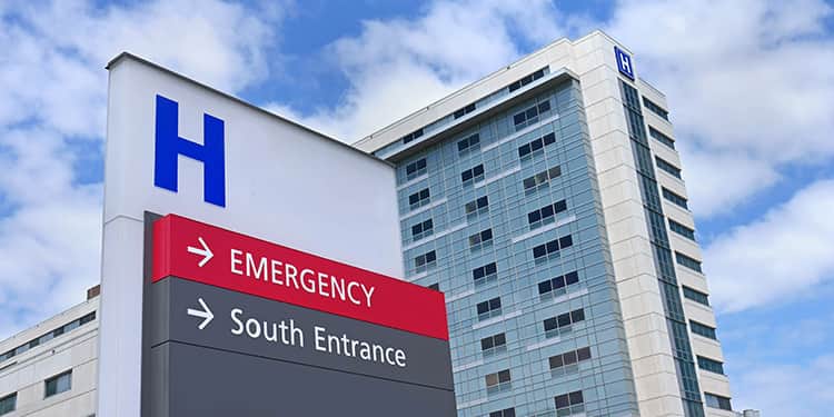 A hospital display and Emergency Sign.